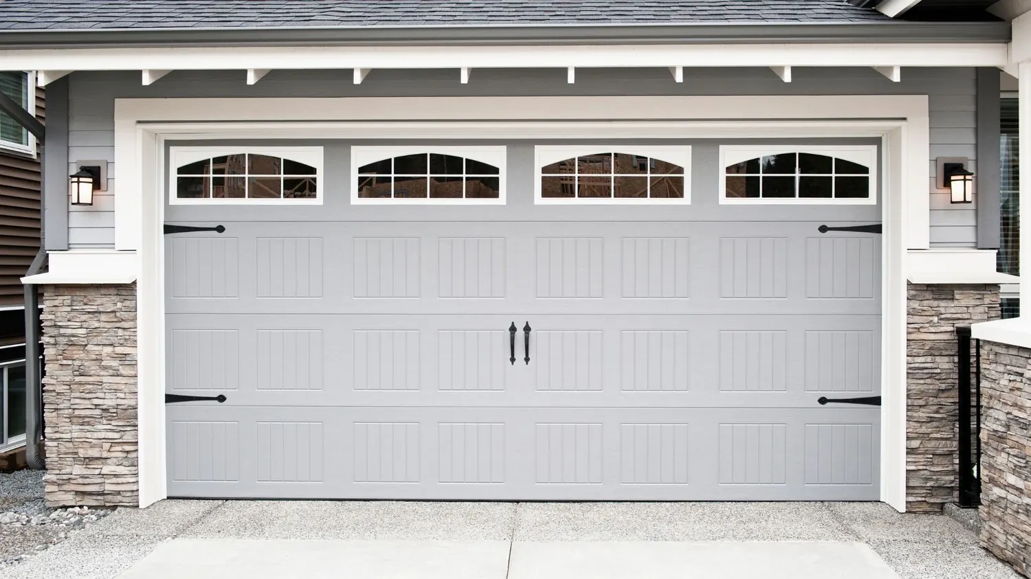 Carriage-style garage door installation in New Braunfels, TX