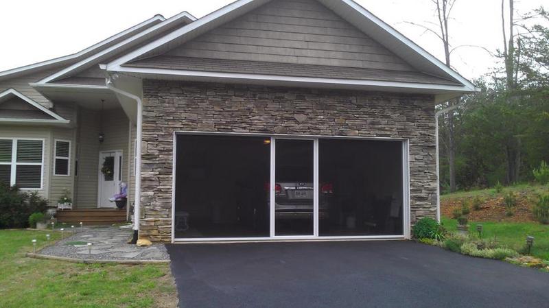 Home exterior with a Lifestyle garage door screen installed